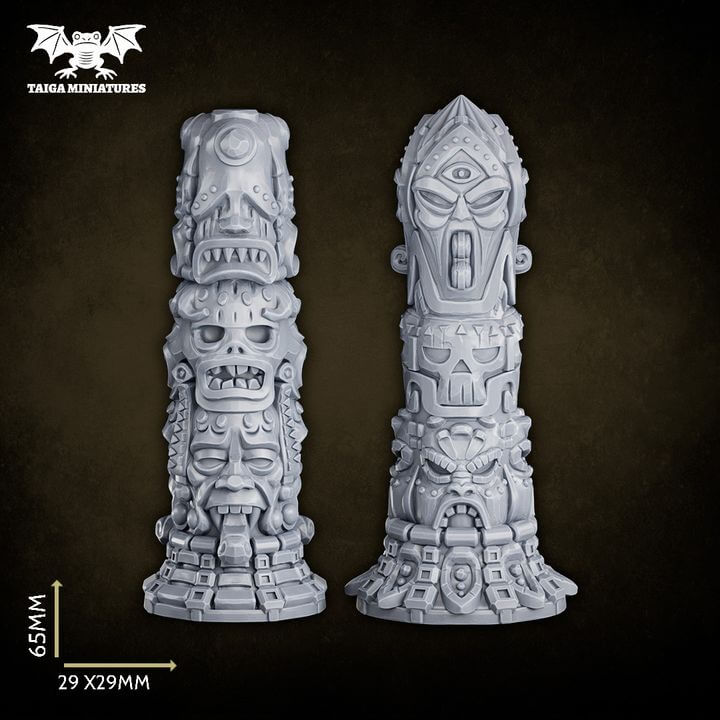WarpLand miniature set of two resin totems covered in stacked skull carvings, grimacing faces, and occult geometric engravings, each standing 65mm tall on a 29x29mm base, shown unpainted in grey resin from front and back angles