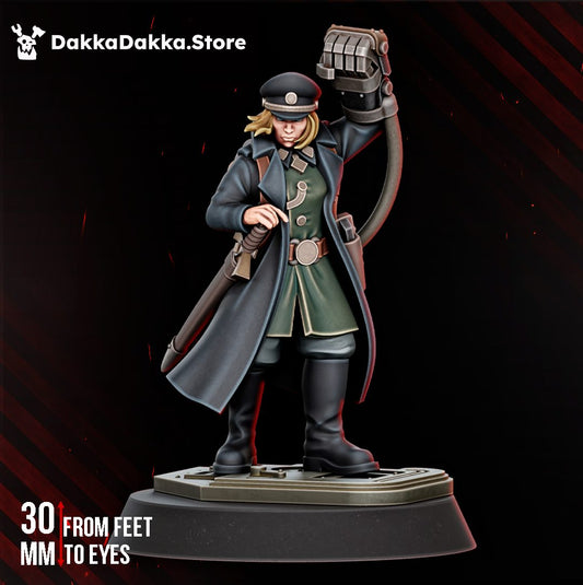 Kommissar Graber 30mm resin miniature front view, greatcoat, green tunic, raised mechanical arm and peaked cap