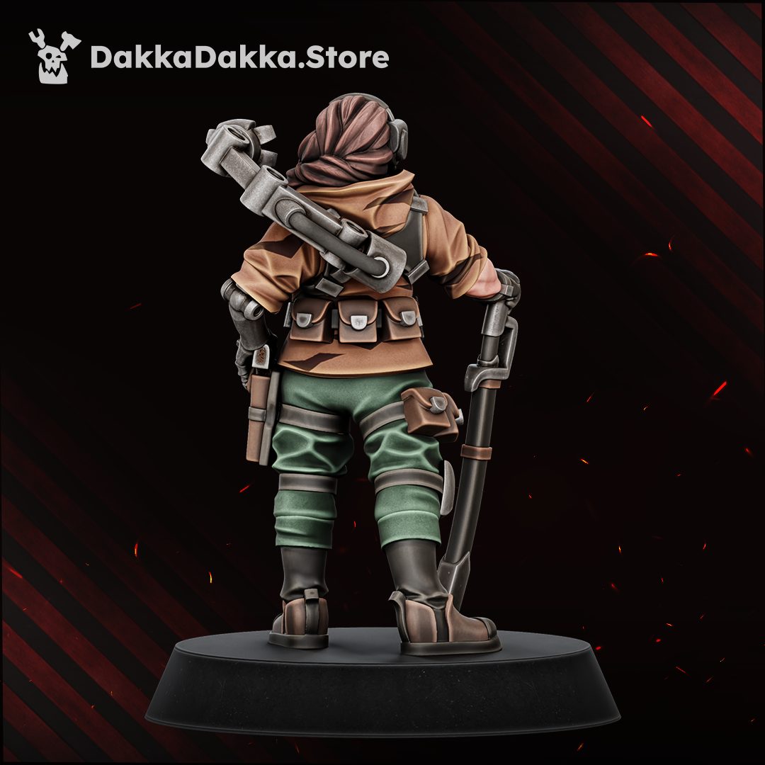 Rear view of the painted commander miniature showing back pouches, weapon sling, and utility belt detail