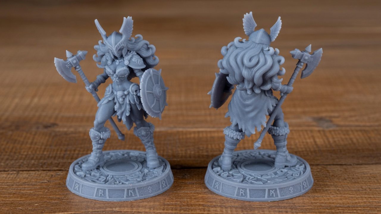 Odin Daughter 6 resin miniature front view showing winged helm, double-headed axe, knotwork shield and runic base, 32mm scale