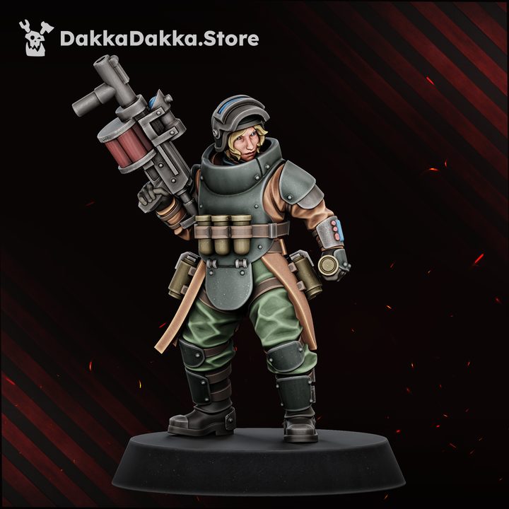 Female grenadier miniature with drum-fed launcher and ammo belt, front view