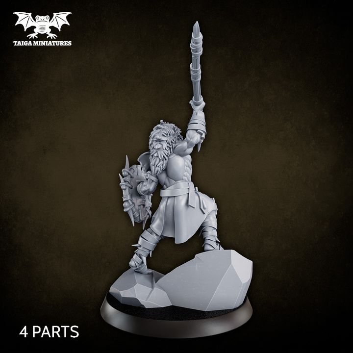 WarpLand miniature Manik Chief of the Skull Riders 32mm resin model by Taiga Miniatures, dynamic barbarian warrior pose with raised spear and skull shield standing on rocky base