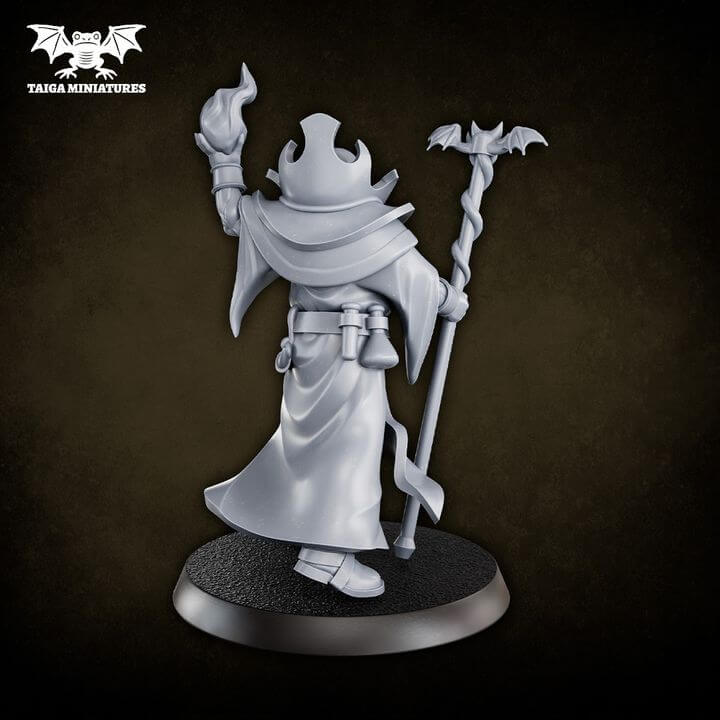 WarpLand miniature Warlock resin model, front and back view, 31mm scale, holding bat-topped staff and flaming skull, flowing robes and armoured collar detail, supplied unpainted in 5 parts